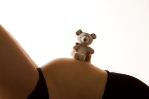 teddy-sitting-on-pregnant-belly