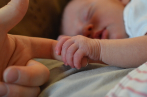 baby-holding-parents-finger